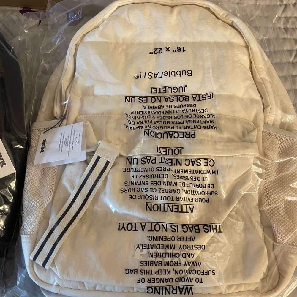 Victoria's Secret Pink- cream quilted puffer backpack
NWT